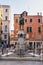Venice, Italy - Jun 30, 2020: The statue of Carlo Goldoni on the Piazza Campo San Bartolomeo in Venice, Italy