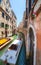 VENICE, ITALY - JUNE 15, 2016: two boat meets in small canal