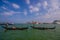 VENICE, ITALY - JUNE 18, 2015: Gondola ride on Adriatic sea, people looking Venice on the side and a big cruise arriving