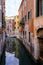 Venice, Italy - June 22, 2023: Canal, bridge and ancient houses of Venice