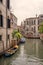 Venice, Italy - June 22, 2023: Canal, bridge and ancient houses of Venice