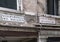 Venice, Italy - June 30, 2017: A view of dilapidated facades of the houses with signs. Text means for s.Marco and Soto