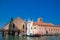 VENICE, ITALY - March 24, 2019: Old building ashore little channel in Venice