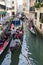 Venice, Italy - May 1, 2017: Gondolas are congested, yet try to work together to keep traffic flowing