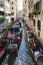 Venice, Italy - May 1, 2017: Gondolas are congested, yet try to work together to keep traffic flowing