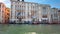 VENICE, Italy - May 2019: luxury taxi boat of Venice swims past the camera at sunset time against the backdrop of the