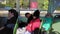 VENICE, Italy - May 2019: Sleeping people during the day, a man and a woman moving on a water tram of a vaporetto. The