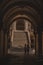VENICE, ITALY - May 25, 2019: view of arch gallery of building walking people