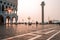 VENICE, ITALY - OCTOBER 6 , 2017: Morning Piazza San Marco, tourists walk on square