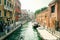 Venice, Italy. Quay of a water channel with moored cargo boats.