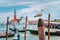 Venice, Italy. Seagull on pole against blurred panorama view of Chiesa di San Giorgio Maggiore or San Giorgio Maggiore