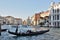 VENICE, ITALY - Sep 23, 2016: typical scene on canale grande, a venetian gondola with gondoliere and tourists