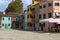 Venice, Italy - September 03, 2018: Island of Burano, the center of the cathedral square and colorful facades of the corner