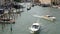 VENICE, ITALY, SEPTEMBER 7, 2017: lot of the boats and gondolas are riding the famous Venetian Grand Canal