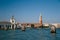 Venice, Italy - September, 9 2018: St. Mark`s Square, Doges Palace, St Mark`s Campanile bell tower, Punta della Dogana and other