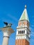 Venice, Italy, St. Mark`s Square Piazza San Marco detail of Column of the Lion and Bell Tower of Saint Mark