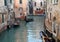 Venice Italy the water way with gondola and a man called GONDOLIERE in Italian Language