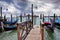 Venice lagoon. Gondolas moored by Saint Mark square