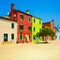 Venice landmark, Burano island street, colorful houses, Italy