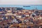 Venice panoramic aerial view with red roofs, Veneto, Italy. Aerial view with dense medieval red roofs of Venice, Italy