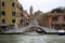Venice the pearl of Italy bell tower cross Grand canal boat bridge wooden piles
