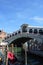 Venice with Ponte Rialto beautiful typical venetian construction, houses colored, Venice, Italy summer 2016