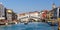 Venice Rialto bridge over Canal Grande with gondola travel traveling holidays vacation town panorama in Italy