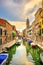 Venice rio San Barnaba cityscape, water canal, church and boats. Italy