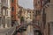 Venice river detail with small bridge