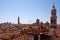 Venice roofs with typical wooden altana balcony, blue sky