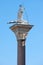 Venice, San Todaro statue on column in sunny day in Italy