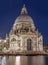 Venice - Santa Maria della Salute church and gondolas in evening