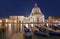 Venice - Santa Maria della Salute church and gondolas in evening