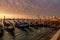 Venice sunrise and Venice gondolas on San Marco square at sunrise, Grand Canal, Venice, Italy