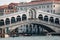 Venice / Veneto / Italy - February 18, 2020: The Rialto Bridge Ponte di Rialto, the oldest of the four bridges spanning the Gran