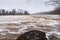 The Venta Rapid is the widest waterfall in Europe. High water level in spring day, so that the waterfall is almost invisible.