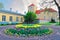 Ventspils Castle and tulips in flowerbed in Latvia