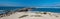 Ventura beach and sea rock wall jetty on the California coastline USA