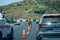 Ventura County Fire Department personnel direct traffic near a downed motorcyclist in the Conejo Pass  Northbound lane.