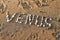 Venus inscription is lined stones on the beach