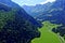 Verdant Harmony Valley\\\'s Lush Forests and Majestic Mountains