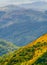 Verdant slopes of Monteverde under a dynamic sky, showcasing the rich biodiversity and layered mountain vistas of
