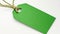 Verde Vogue: Realistic Green Clothing Tag Mockups