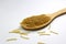 Vermicelli in a wooden spoon on a white background