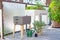 A vermicomposting system worm composter sits on an apartment balcony