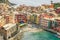 Vernazza bay above cliffs, Cinque Terre, Liguria, Italy with boats