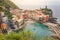 Vernazza bay above cliffs, Cinque Terre, Liguria, Italy with boats