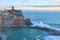 Vernazza - The medieval fortress Doria Castle and the old harbor.