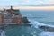 Vernazza - The medieval fortress Doria Castle and the old harbor.