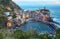 Vernazza - The medieval fortress Doria Castle and the old harbor.